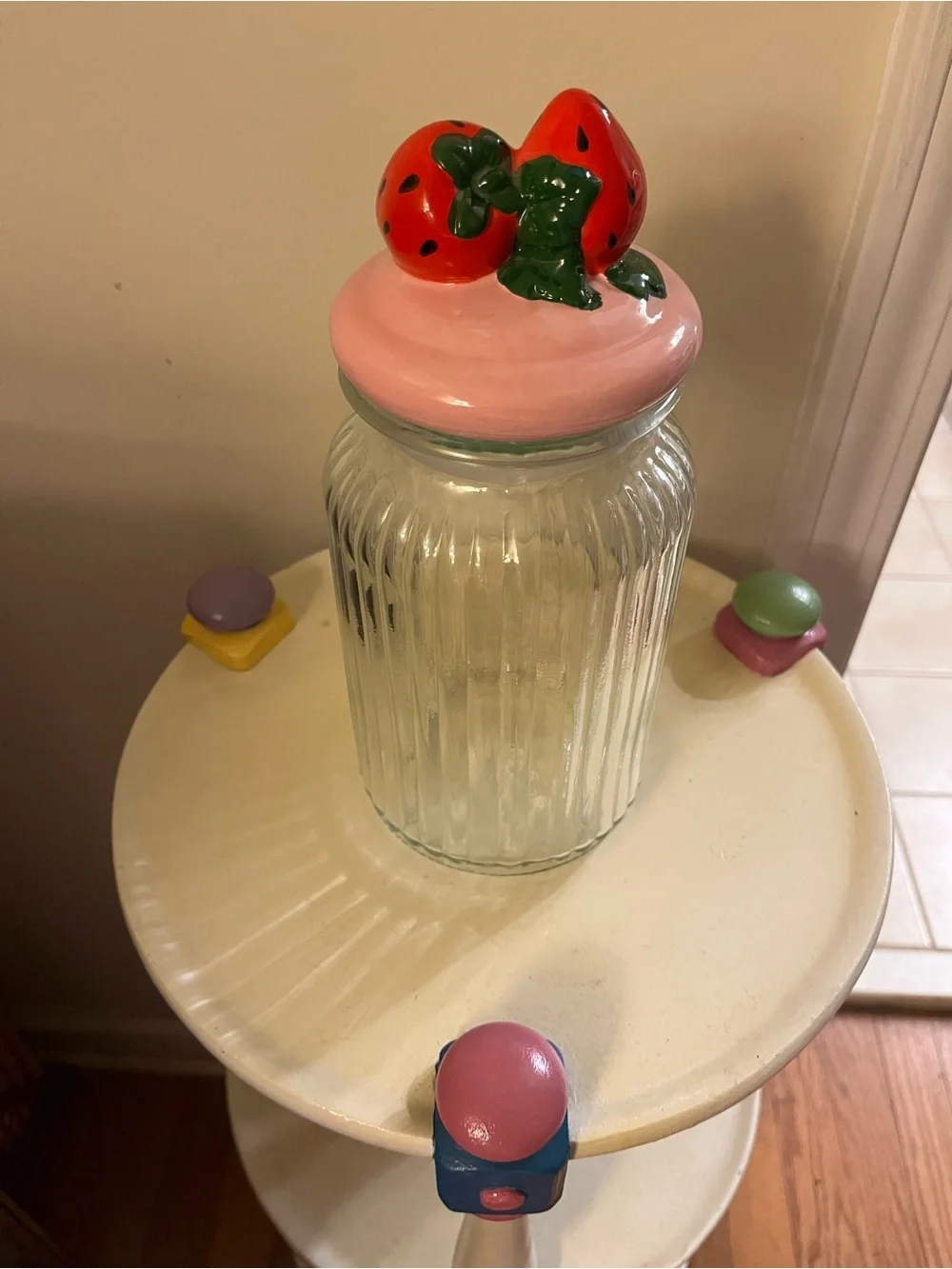 Clear strawberry lidded jar